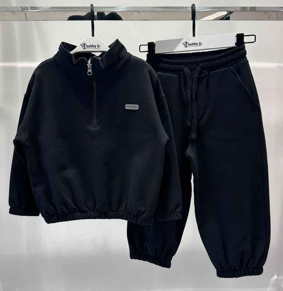 Zwarte joggingset met halve rits