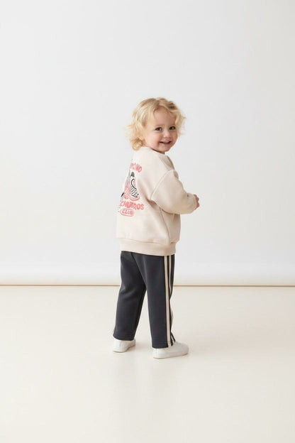 Beige sweater met graphic print & gestreepte joggingbroek